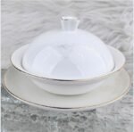Understated Mountain Opulence Four‑Leaf Lucky Cup with saucer.
